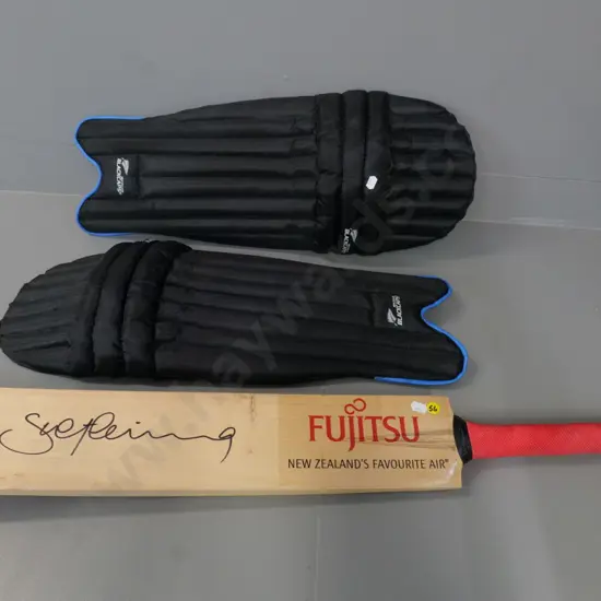 promotional Fujitsu cricket bat signed by Stephen Fleming and pair Black Caps branded shin guards marked youth