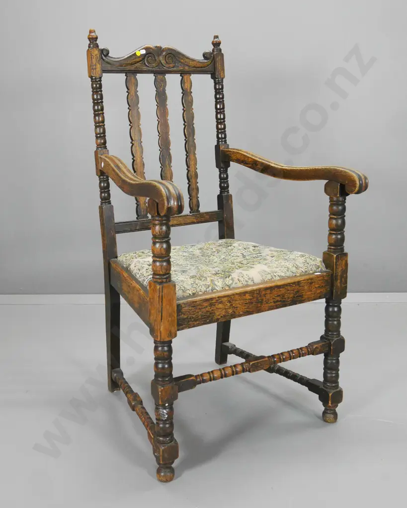 vintage oak-framed occasional chair w/carved top rail. fading to floral tapestry, wear to polish H1140 W580 D600 Image 1++