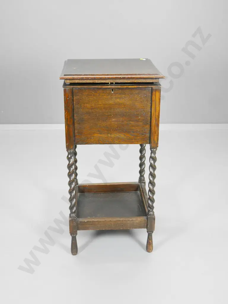 dark stained oak lift-top satin lined work/sewing box with barley twist legs, top is warped H-840 W-400 D-400 Image 1++