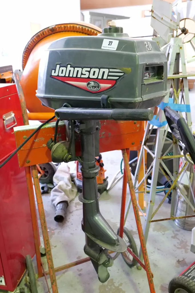 Johnson small outboard motor with cleaning muffs - stand not included Image 1++