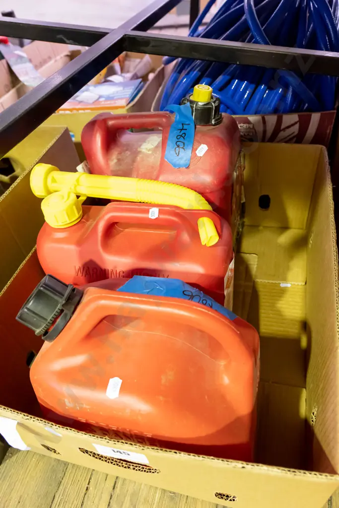 3 petrol containers Image 1++