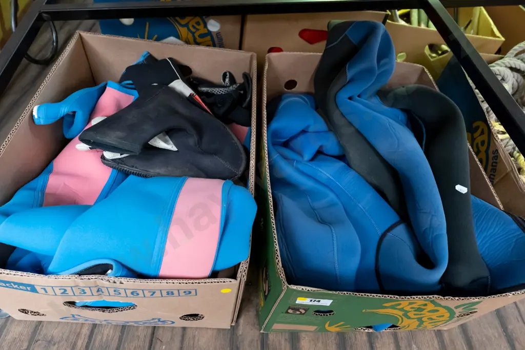 2x boxes of male and female wetsuits and accessories - yellow dots Image 1++