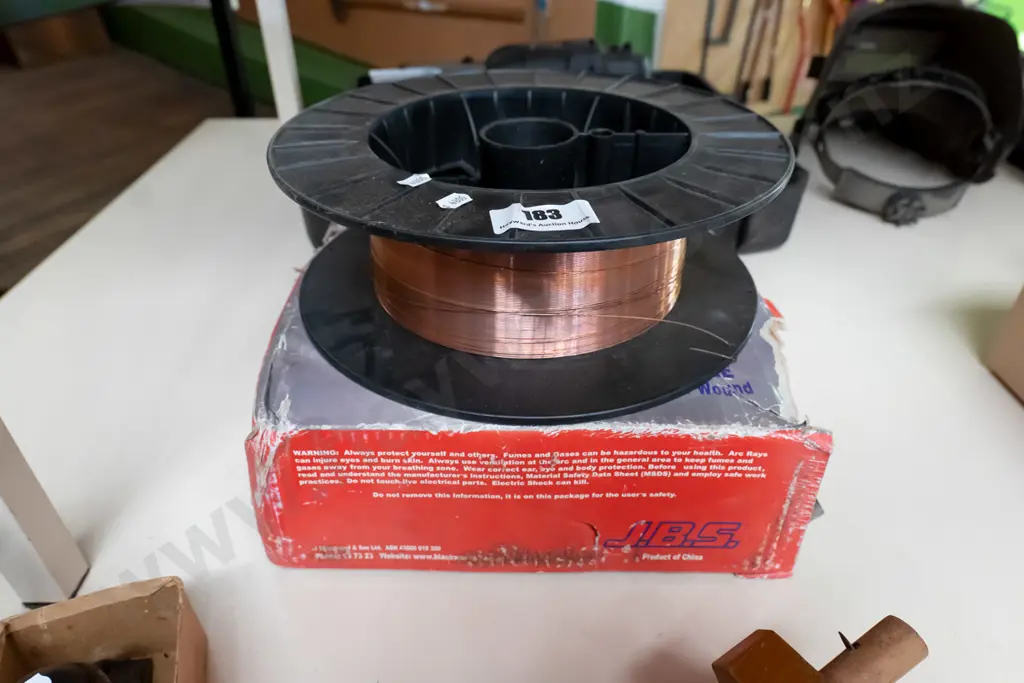 1 part and 1 full spool of welder's wire Image 1++