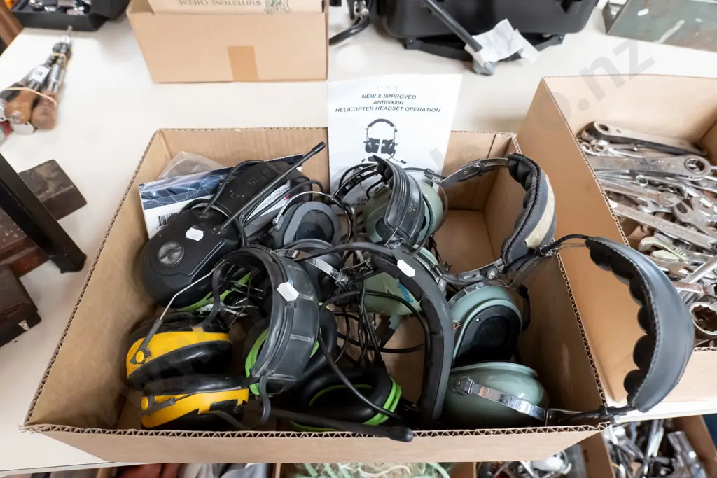 box of various sets of radio and pilots ear muffs  (As Is, No Returns) Image 1++