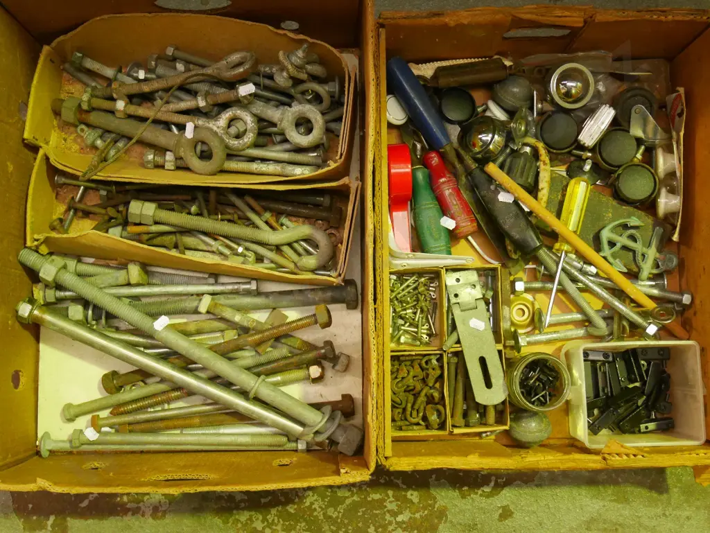 2 boxes; galvanised nuts and bolts, casters, chisels - green dots Image 1++