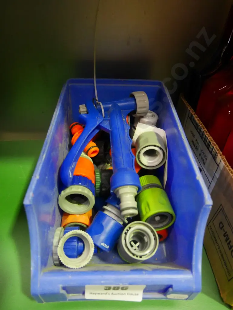 container of garden hose fittings Image 1++