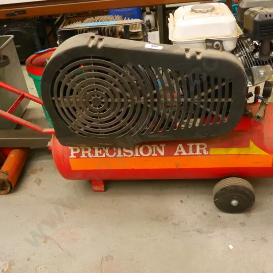 Precision Air air compressor run by 4 stroke petrol engine