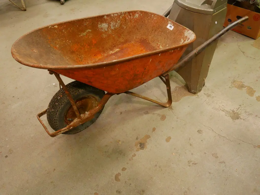 rusty contractor's wheelbarrow Image 1++