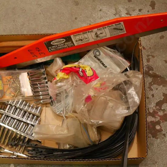 box; sockets, cable ties, nails, wallpaper, straight edge, brush