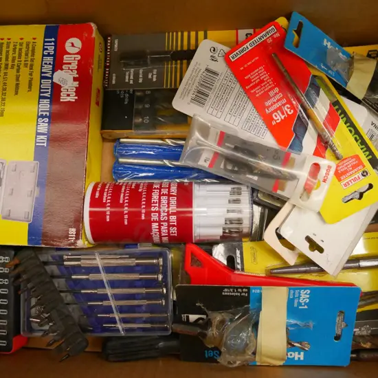 box; screwdrivers, drill bits, hole saw etc
