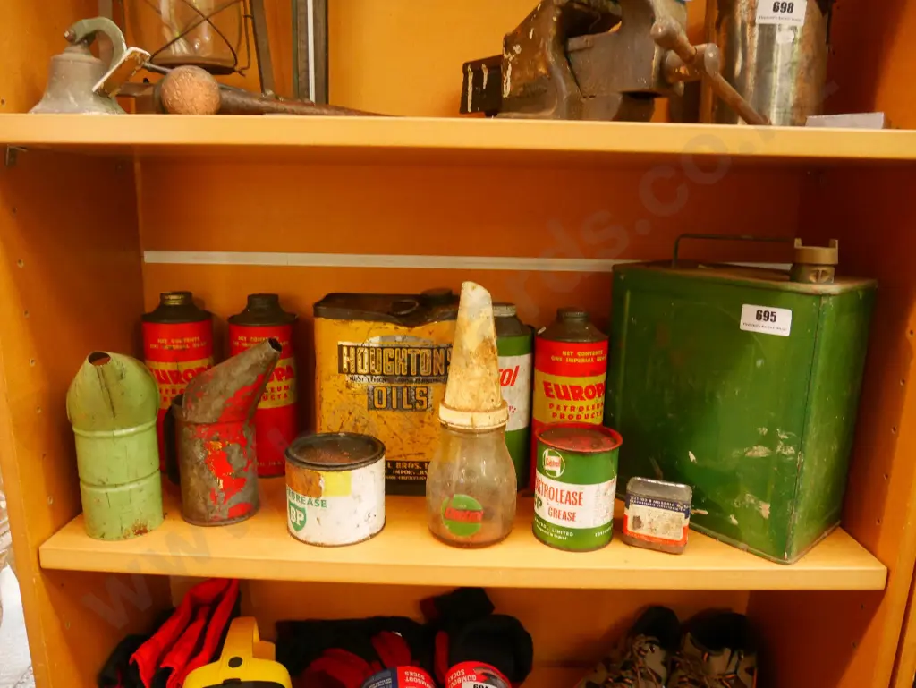 shelf of oil cans etc Image 1++