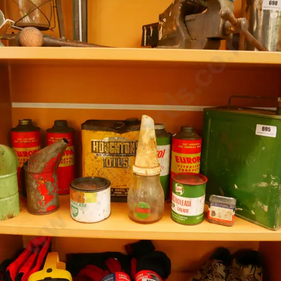 shelf of oil cans etc