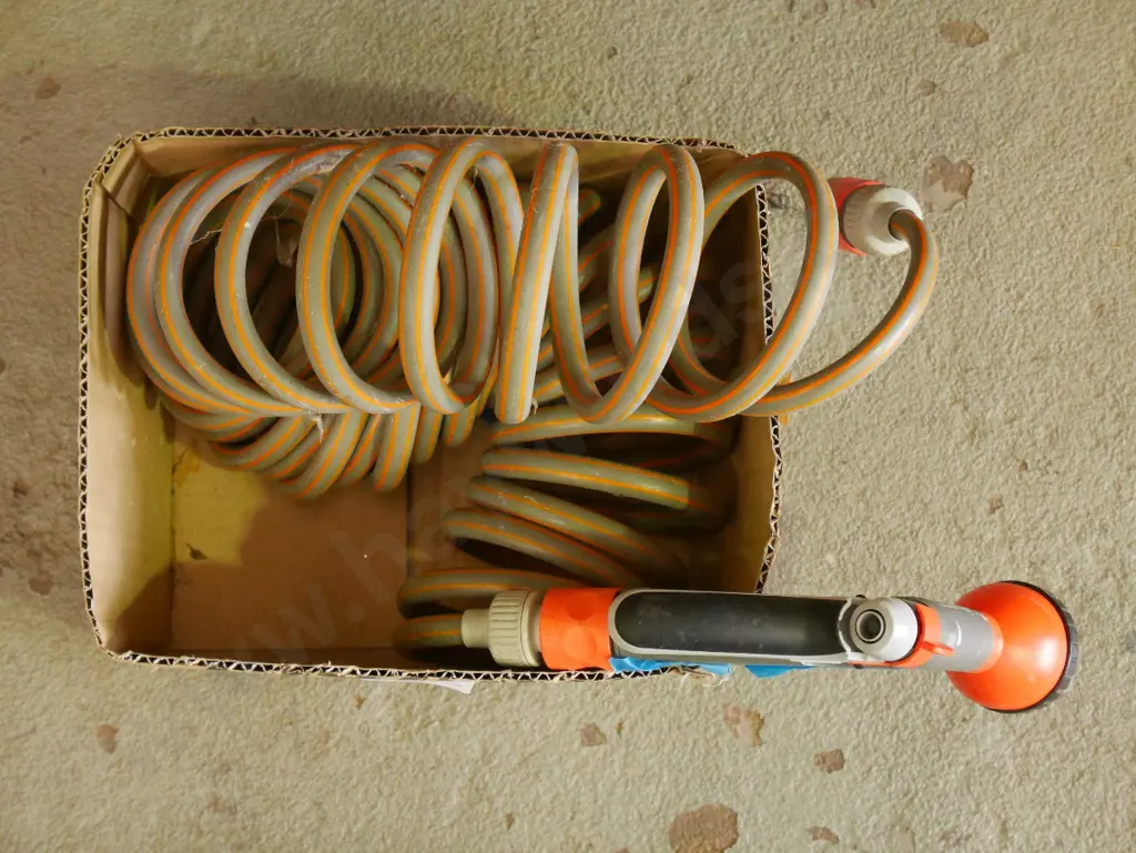 garden hose and spray gun Image 1++