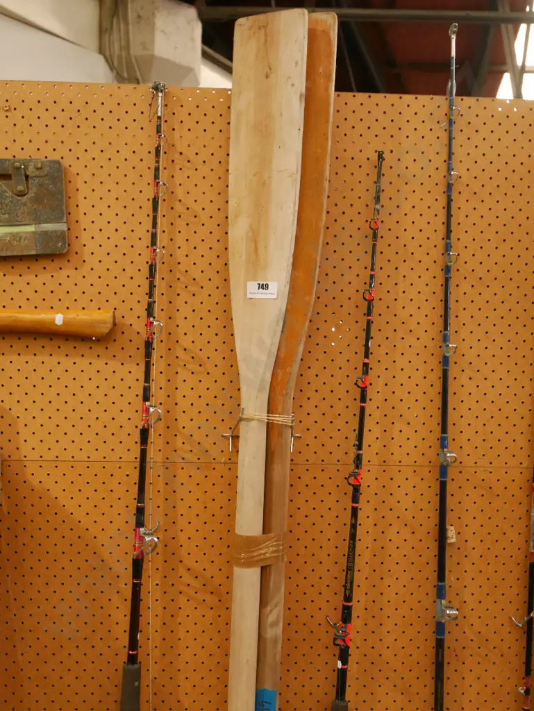 2 unmatched oars Image 1++