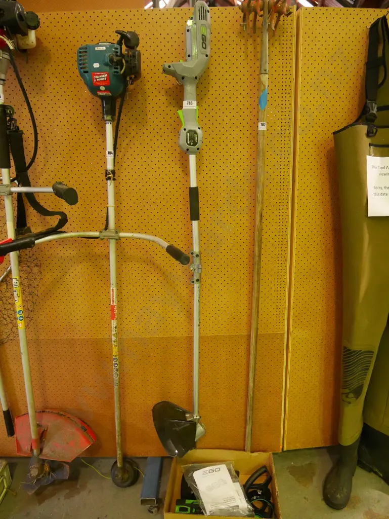 Ego battery powered line trimmer and accessories Image 1++