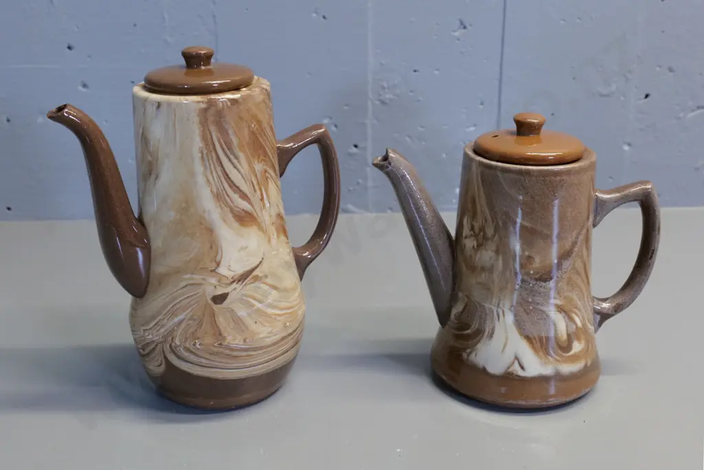 Temuka pottery - 2 Te Rona brown swirl coffee pots, taller one has chip to spout H250 W200 Image 1++