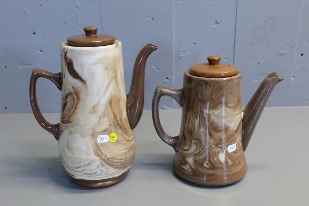 Temuka pottery - 2 Te Rona brown swirl coffee pots, taller one has chip to spout H250 W200 Image 1++
