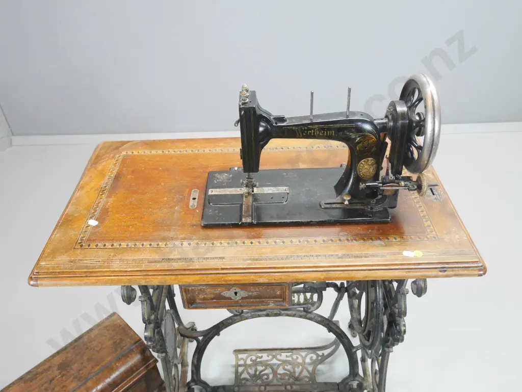 vintage Wertheim sewing machine on cast iron treadle base, timber top, some wear & loss of marquetry H1020 W730 D420 Image 1++