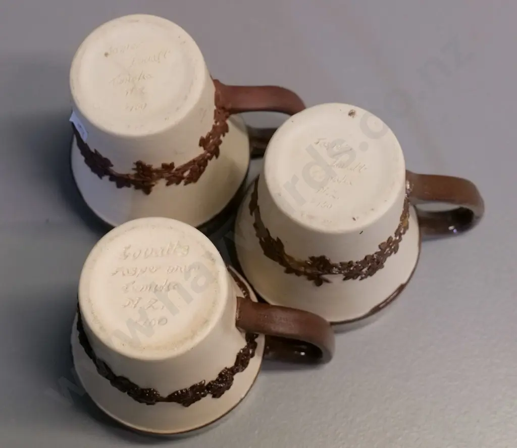 Temuka pottery - 3 brown & cream jasperware mugs - marked Lovatt's, one has piece of relief missing H100 Image 1++
