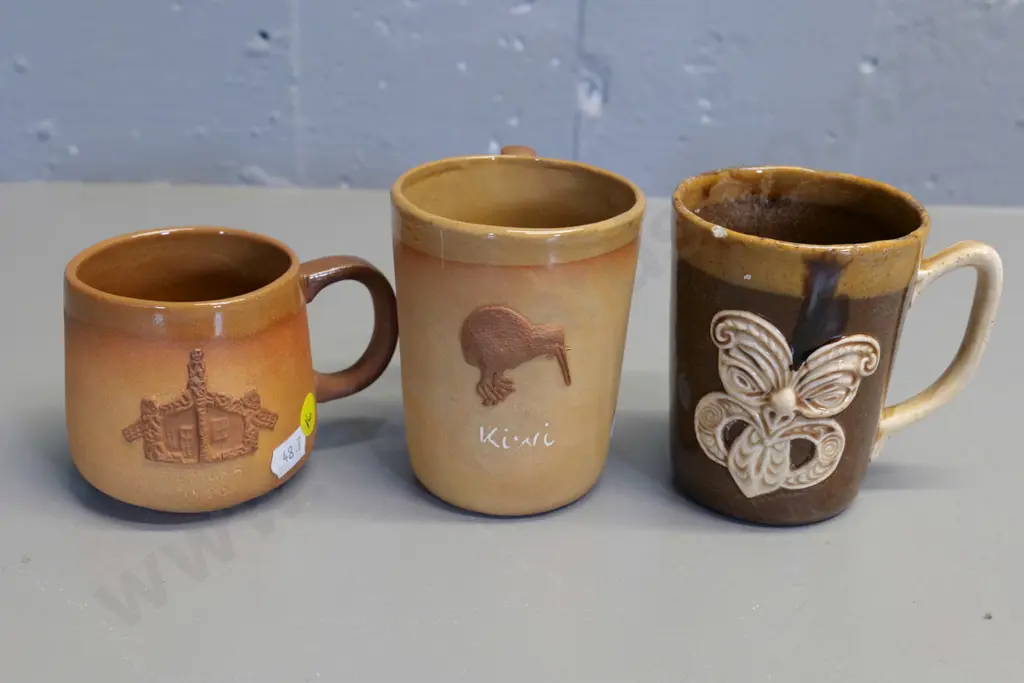 Temuka pottery - 3 Maori motif mugs, smaller w/whare motif dated 1980, each have glaze faults, crack or chip Image 1++