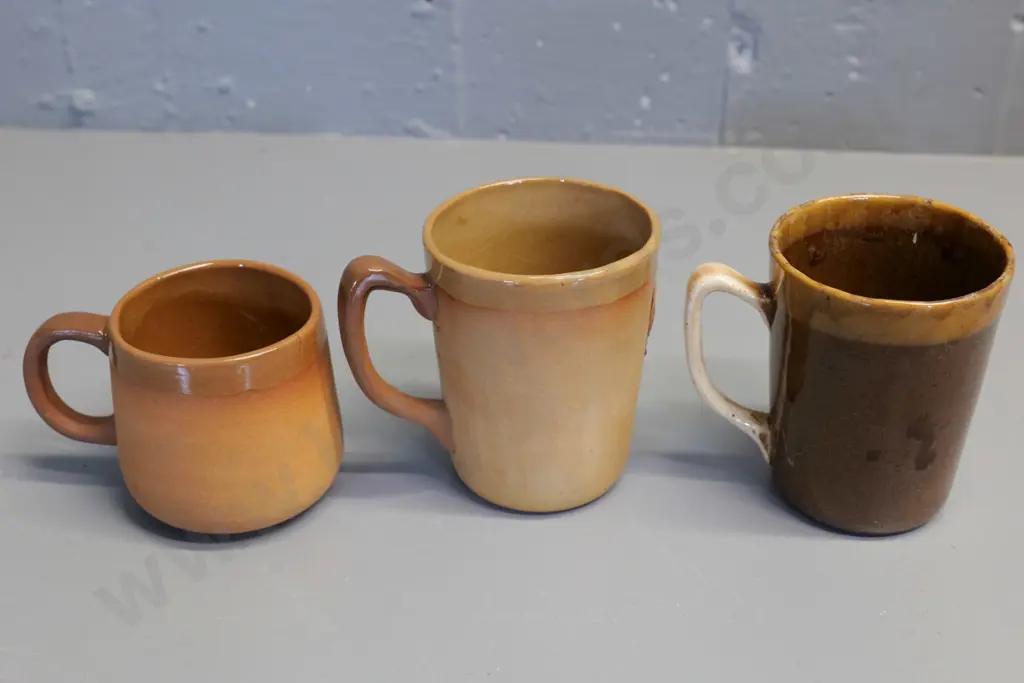 Temuka pottery - 3 Maori motif mugs, smaller w/whare motif dated 1980, each have glaze faults, crack or chip Image 1++