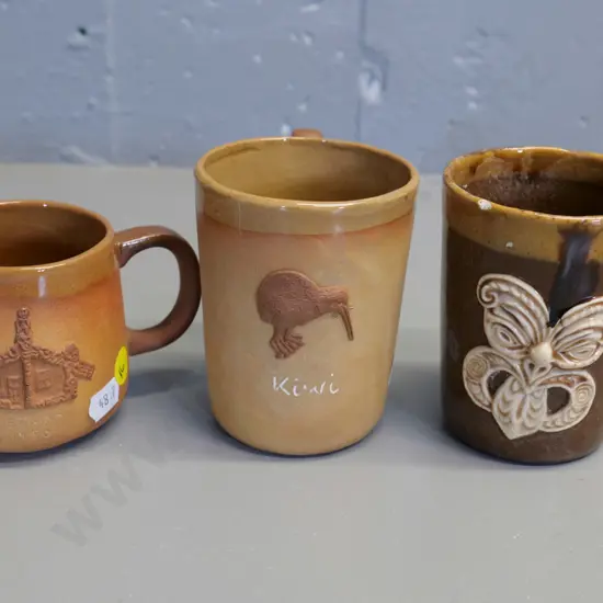 Temuka pottery - 3 Maori motif mugs, smaller w/whare motif dated 1980, each have glaze faults, crack or chip