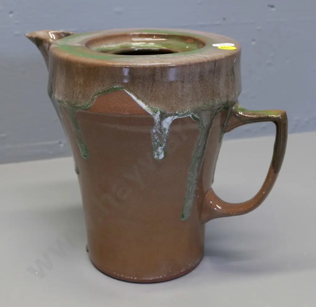 Temuka pottery - green and brown trickle glaze jug, Maori inscription on base & model #CP5 H190 W240 Image 1++