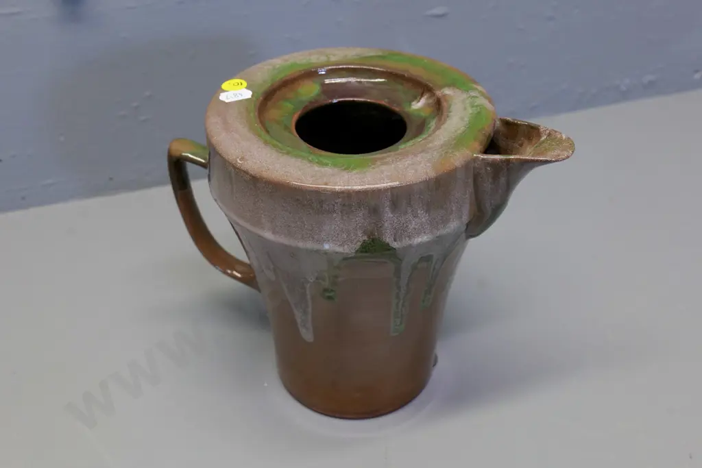 Temuka pottery - green and brown trickle glaze jug, Maori inscription on base & model #CP5 H190 W240 Image 1++