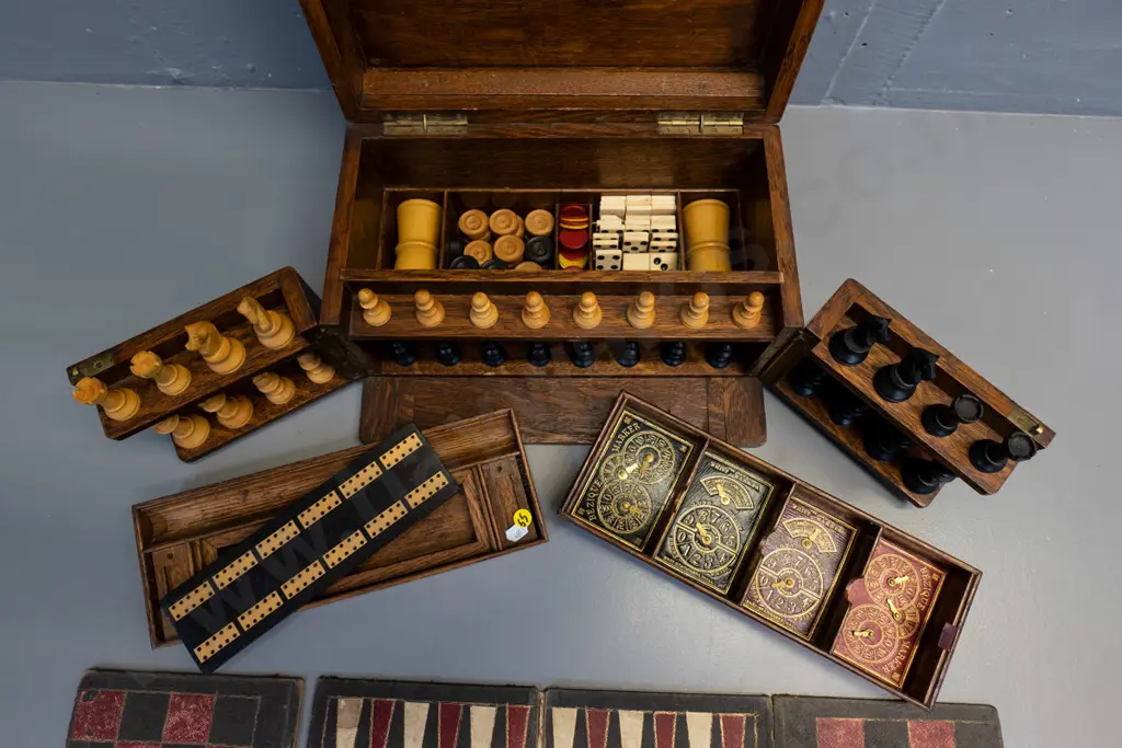 vintage oak-cased games set with fitted interior, hinged opening panels, and game pieces - dominoes, chess, cribbage etc Image 1++