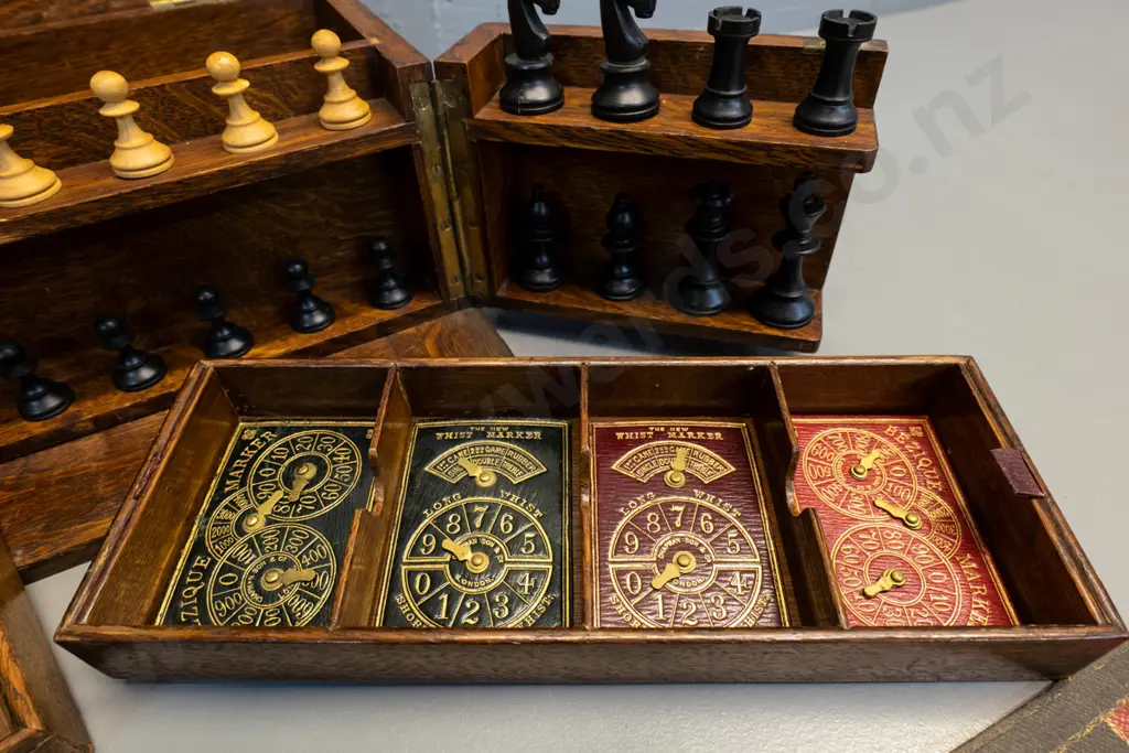 vintage oak-cased games set with fitted interior, hinged opening panels, and game pieces - dominoes, chess, cribbage etc Image 1++