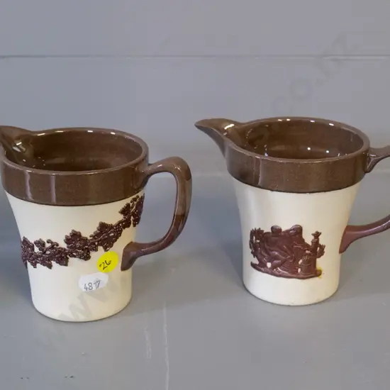 Temuka pottery - 2 brown & cream jasperware jugs, signed Lovatt, one dated 1960. H-100