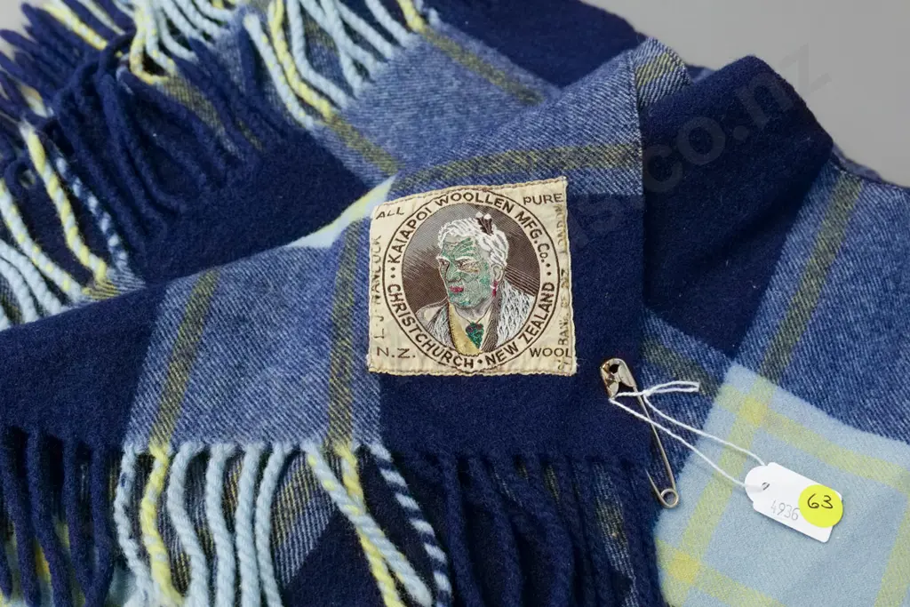 Kaiapoi Christchurch wool travel rug - has small hole in centre, writing on label Image 1++