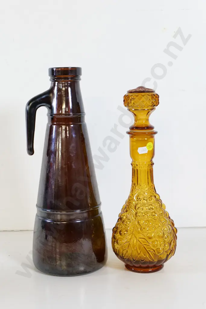 retro amber glass stoppered bottle H-320 and a heavy brown glass tall handled bottle Image 1++
