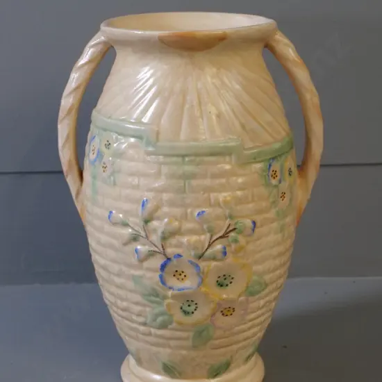 raised pattern handled vase (Arthur Wood?) - small chips to blue flower on one side. H-260
