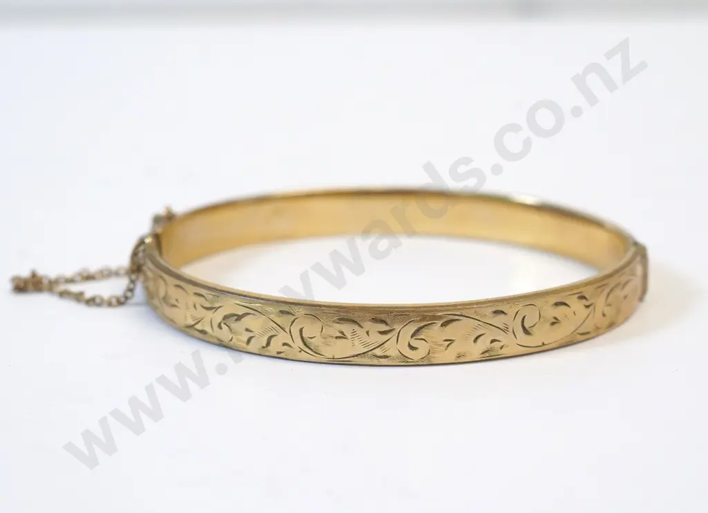 rolled gold bangle with safety chain Image 1++