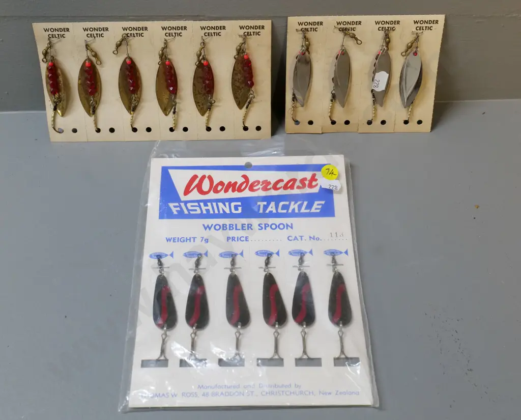 16 assorted unused Wonder brand fishing lures on retail card backing Image 1++