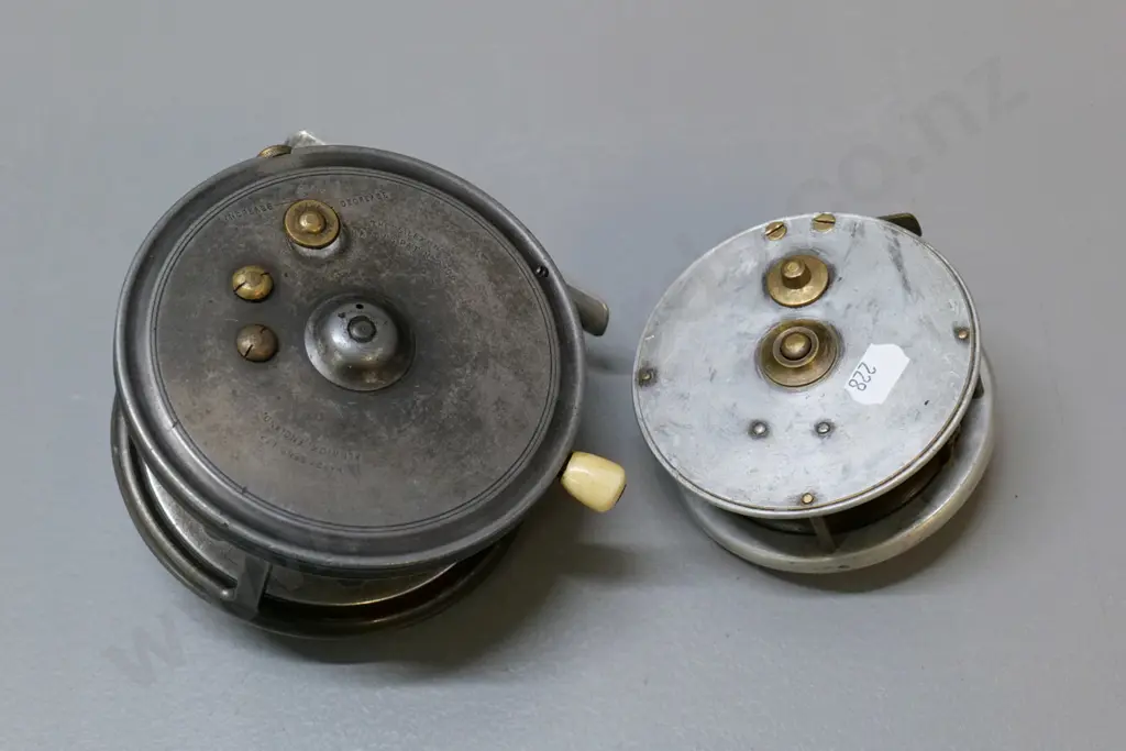 2 metal fishing reels, one with bone handles, larger is Hardy's The Silex No. 2, D-120 Image 1++