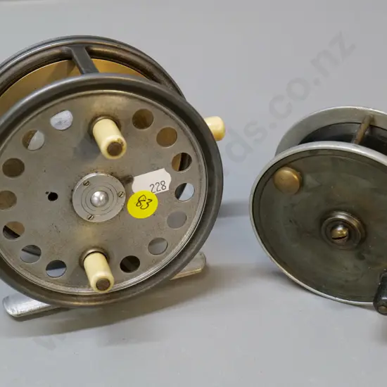 2 metal fishing reels, one with bone handles, larger is Hardy's The Silex No. 2, D-120