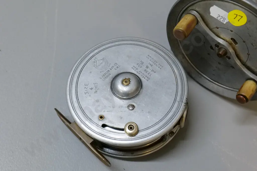 2 English fishing reels - Farlow Holdfast & other slightly larger with bone handle, diameter 110 Image 1++