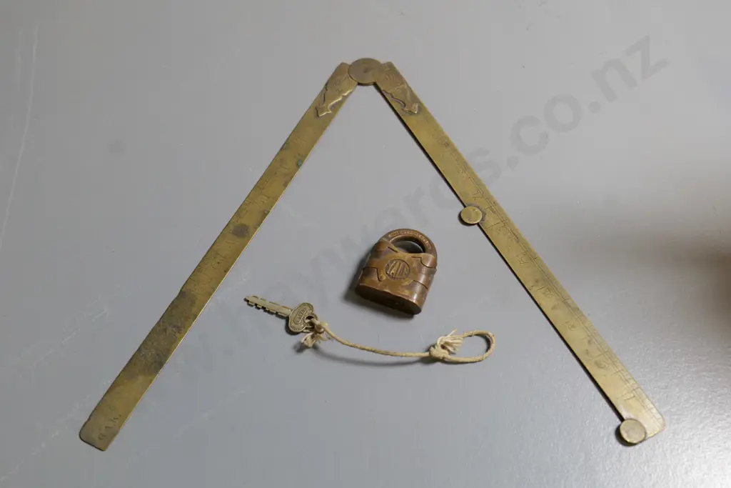 vintage folding brass rule marked John Rabone & Sons L-315 and Yale padlock with key Image 1++