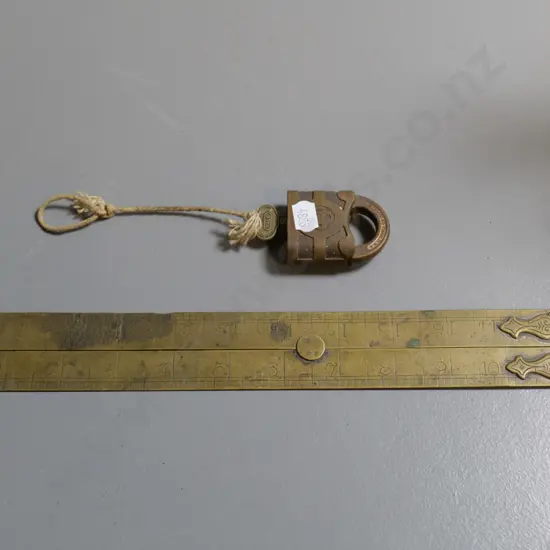 vintage folding brass rule marked John Rabone & Sons L-315 and Yale padlock with key