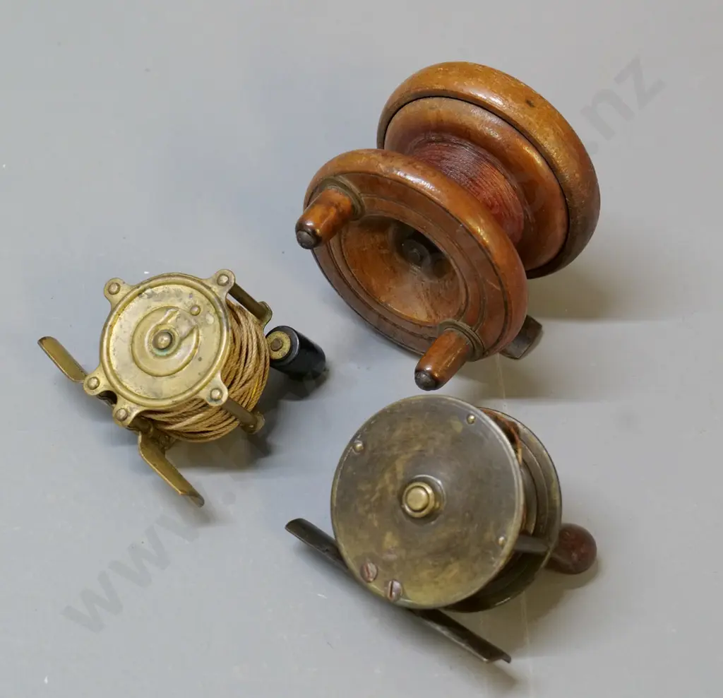 3 small vintage fishing reels - 2 brass & one wood diameter 70 - none have maker's mark Image 1++