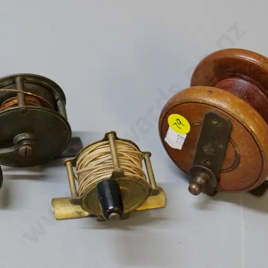3 small vintage fishing reels - 2 brass & one wood diameter 70 - none have maker's mark