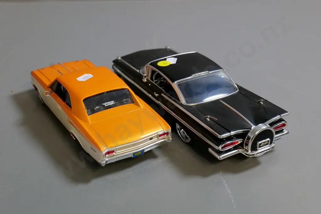 2 die-cast model cars - 1:24 Jada black Chevy Impala and 1:24 Maisto orange Chevy Chevelle Image 1++
