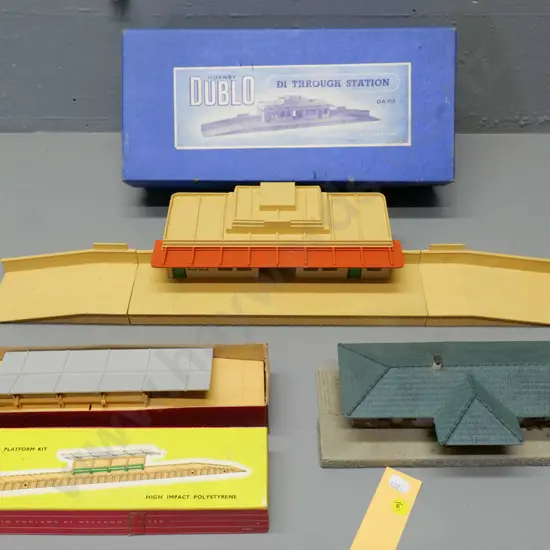 OO/HO gauge model railway items - 2 boxed Hornby Dublo stations, one cast metal, and a German station, some damage
