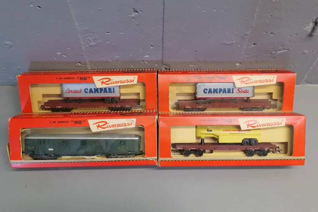 HO gauge model railway items - 4 boxed Rivarossi Italy - truck trailer carriers, cement etc. Image 1++