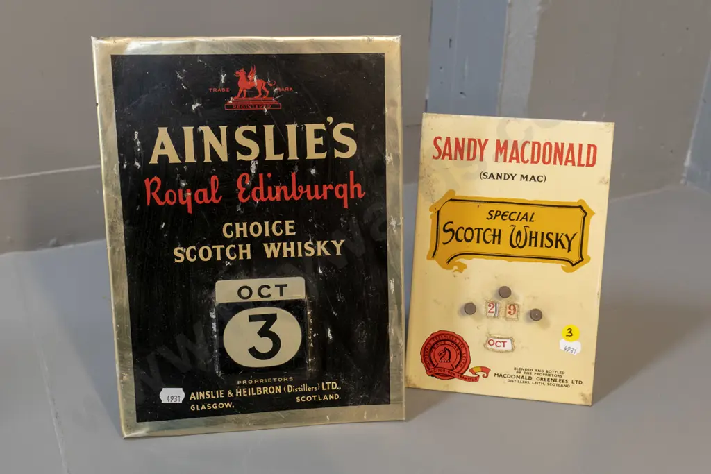 2 Scotch whisky themed advertising calendars - Ainsley's is missing 1&2 metal date card - H-290 W-210 Image 1++