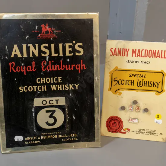 2 Scotch whisky themed advertising calendars - Ainsley's is missing 1&2 metal date card - H-290 W-210