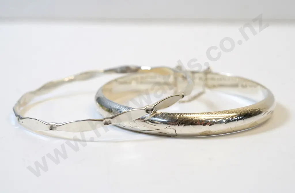 2 silver bangles stamped 925 Image 1++
