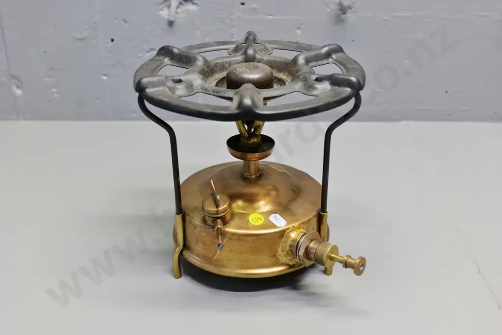 brass camp stove - engraved Paraffin only, Made in England, faint Coleman mark? Has had repairs. H200 D-230 Image 1++